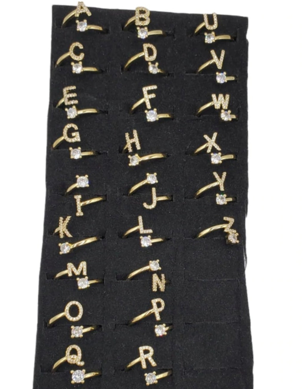 WR-348 Anillo Ajustable todo el abecedario color oro.escoje las letras que gusta en la seccion de abajo
